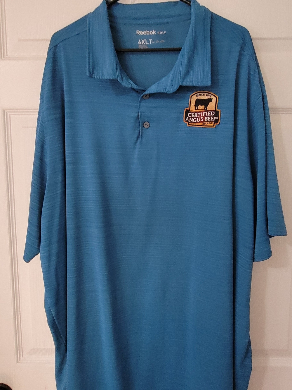 Reebok Men’s Teal-Blue Golf Polo with Certified Angus Beef Patch